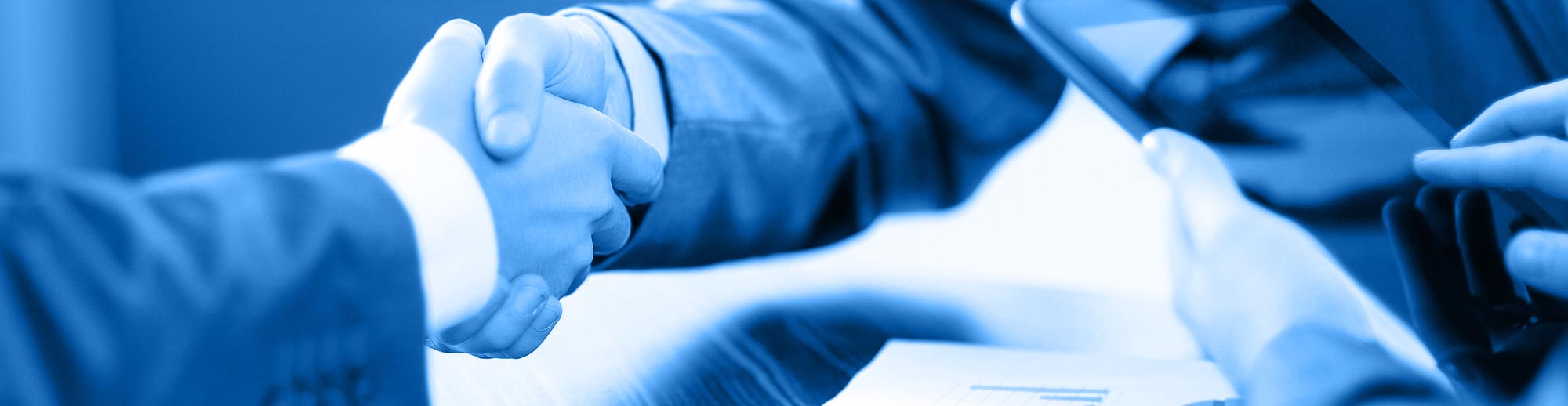 stock photo of professional handshake, all washed in monochromatic blue from the main logo
